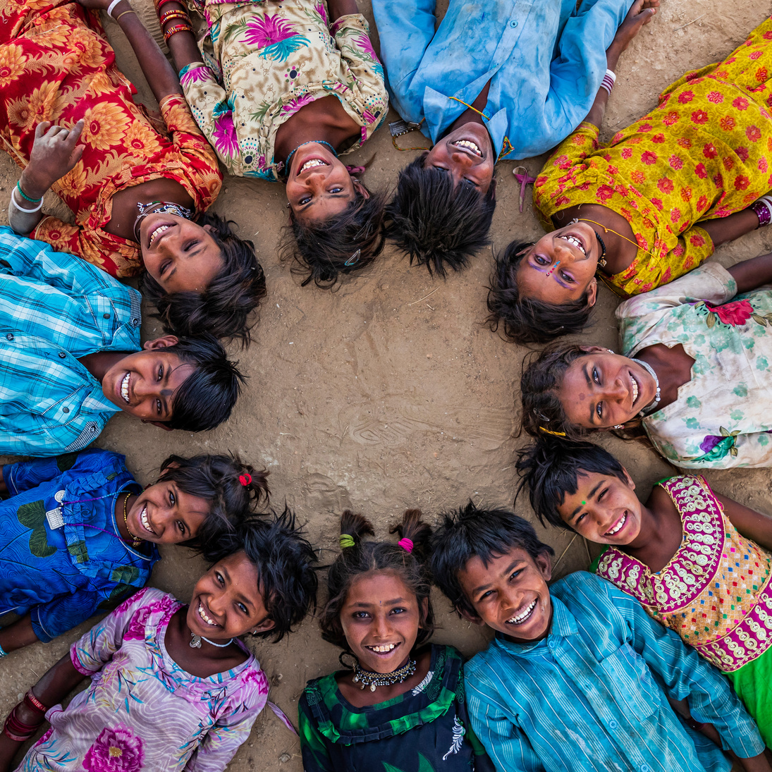 Group of happy Indian children, desert village, India